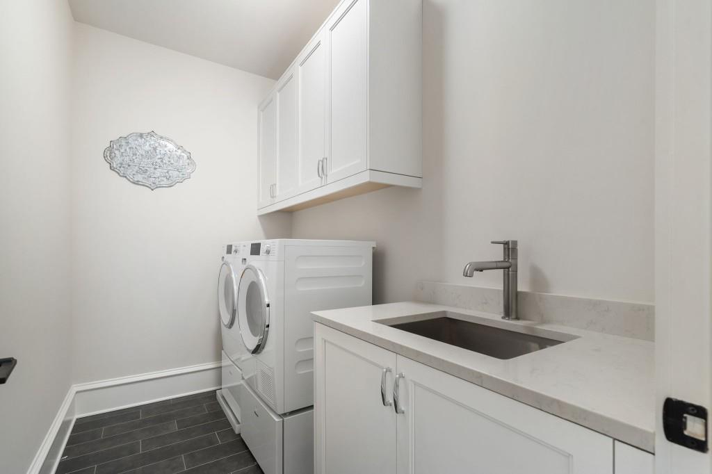 3715 Peachtree Road Northeast, Unit 12 Atlanta, GA 30319 - Photo 36 of 62 a utility room with dryer and washer