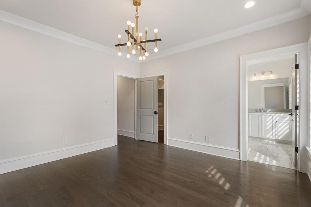 3715 Peachtree Road Northeast, Unit 12 Atlanta, GA 30319 - Photo 38 of 62 a view of an empty room with wooden floor