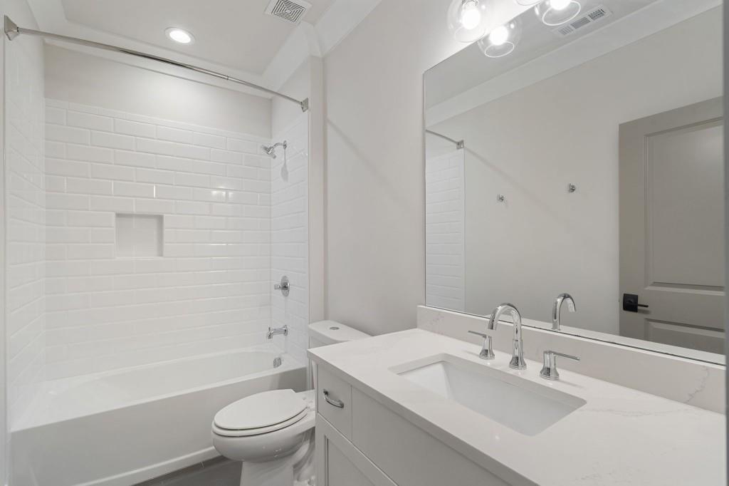 3715 Peachtree Road Northeast, Unit 12 Atlanta, GA 30319 - Photo 53 of 62 a bathroom with a sink a toilet and shower