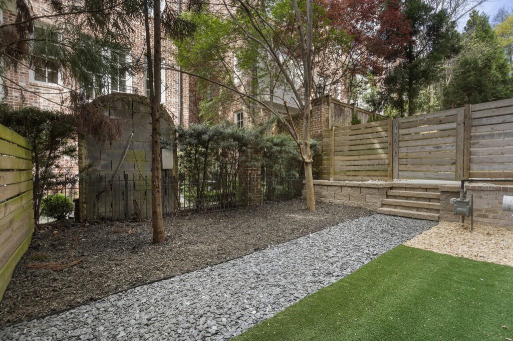 3715 Peachtree Road Northeast, Unit 12 Atlanta, GA 30319 - Photo 56 of 62 a view of a backyard