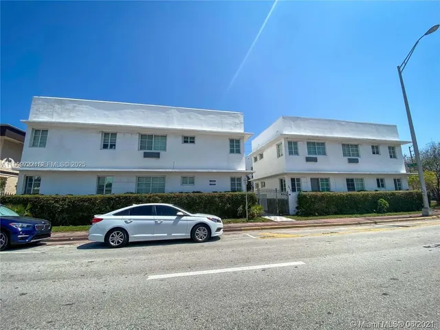 a car parked in front of a building