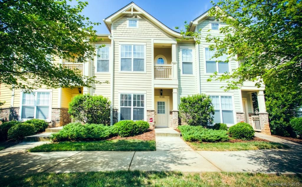 4138 Walker Road, Unit 4138 Charlotte, NC 28211 - Photo 1 of 24 a view of a house with a yard
