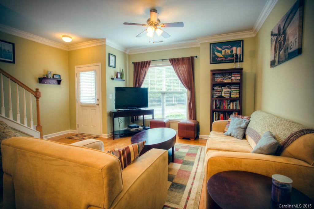 4138 Walker Road, Unit 4138 Charlotte, NC 28211 - Photo 12 of 24 a living room with furniture and a flat screen tv