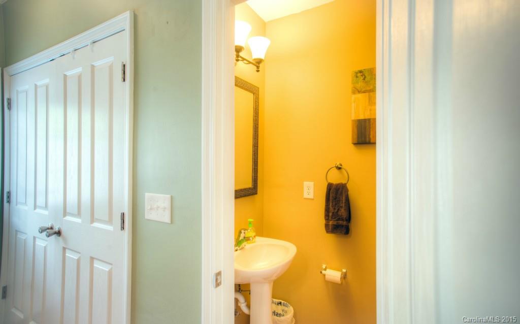 4138 Walker Road, Unit 4138 Charlotte, NC 28211 - Photo 6 of 24 a bathroom with a sink and mirror