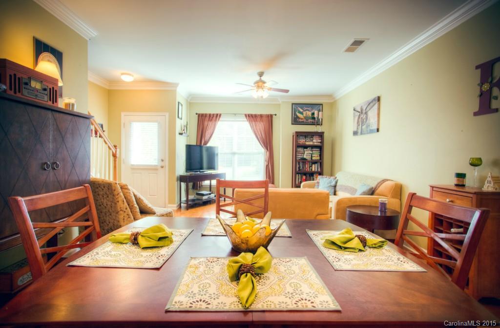 4138 Walker Road, Unit 4138 Charlotte, NC 28211 - Photo 9 of 24 a living room with furniture and a flat screen tv