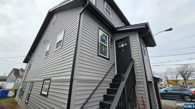 a view of barbeque area with seating