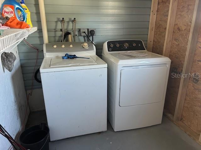 459 Sharks Point North Port, FL 34287 - Photo 4 of 4 a utility room with dryer and washer