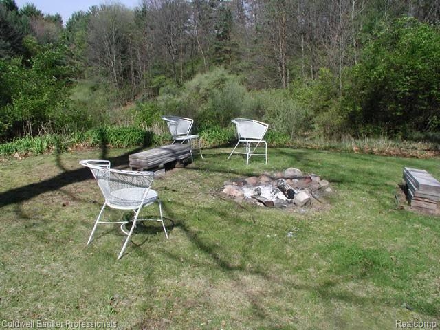 2835 Clark Road Lapeer, MI 48446 - Photo 6 of 25 2835 Clark firepit.JPG