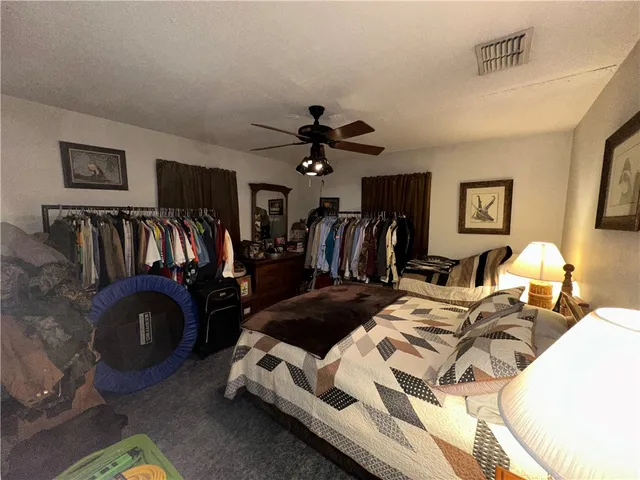 a view of a livingroom with furniture and entryway