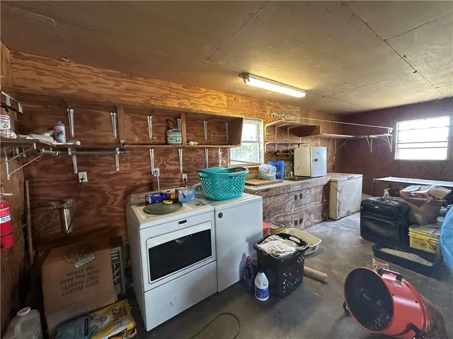 a kitchen with a stove and cabinets