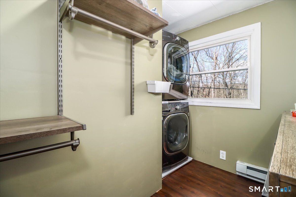 61 Pumpkin Hill Road New Milford, CT 06776 - Photo 25 of 40 a utility room with dryer and washer