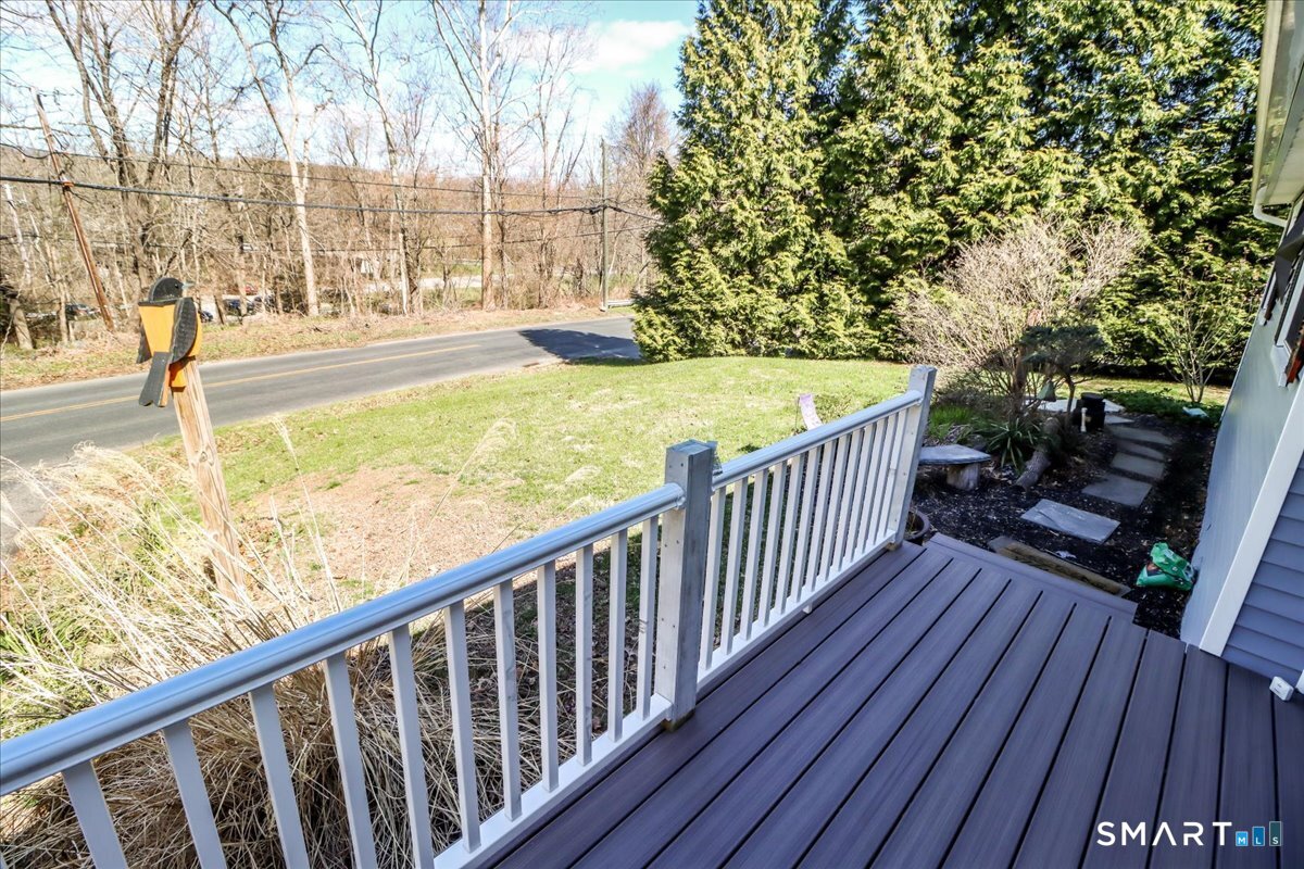 61 Pumpkin Hill Road New Milford, CT 06776 - Photo 26 of 40 a view of balcony with wooden floor and fence