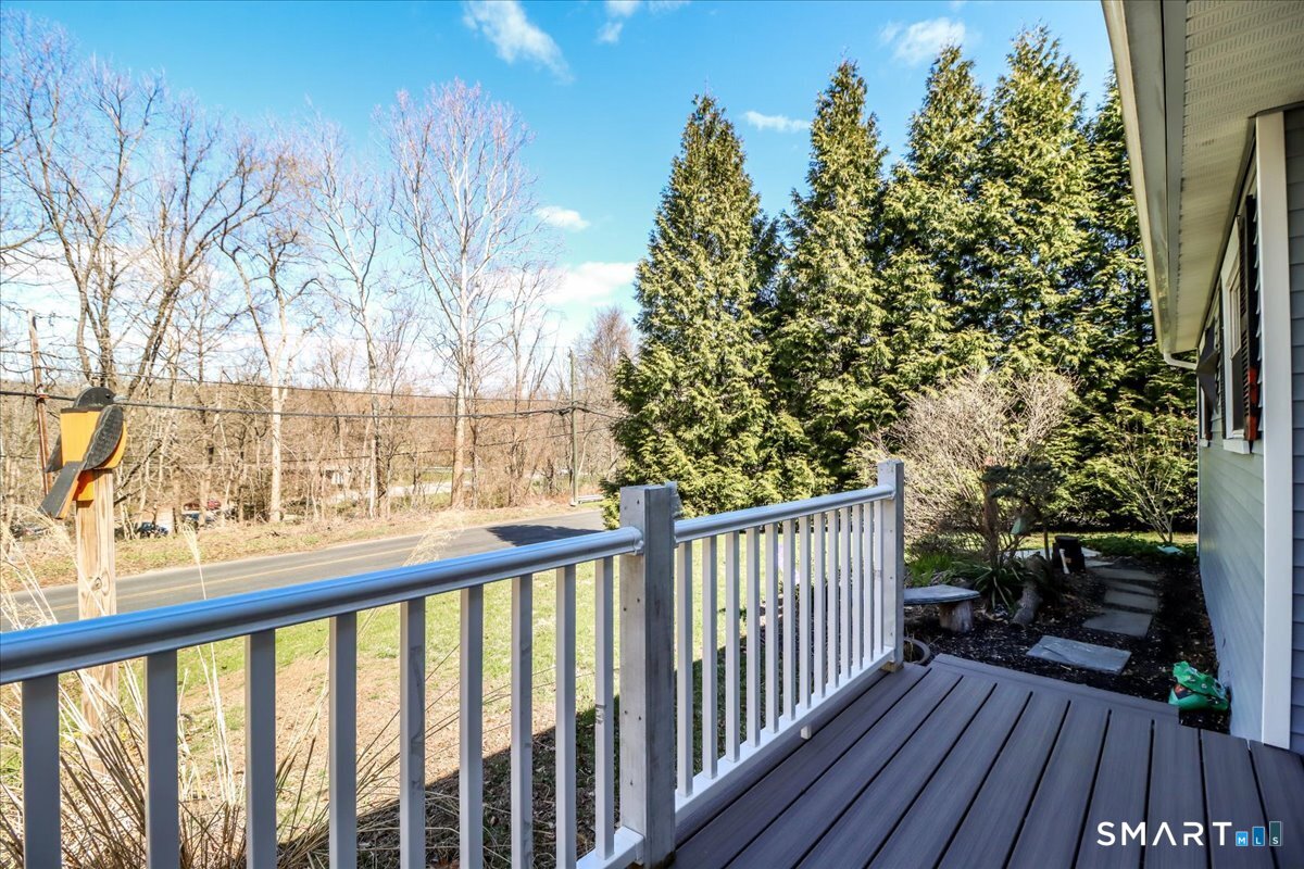 61 Pumpkin Hill Road New Milford, CT 06776 - Photo 27 of 40 a view of trees from a balcony