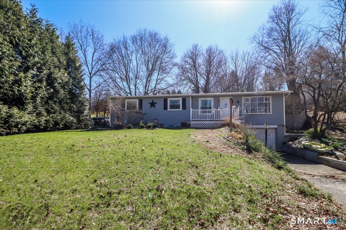 61 Pumpkin Hill Road New Milford, CT 06776 - Photo 29 of 40 a view of a house with a garden