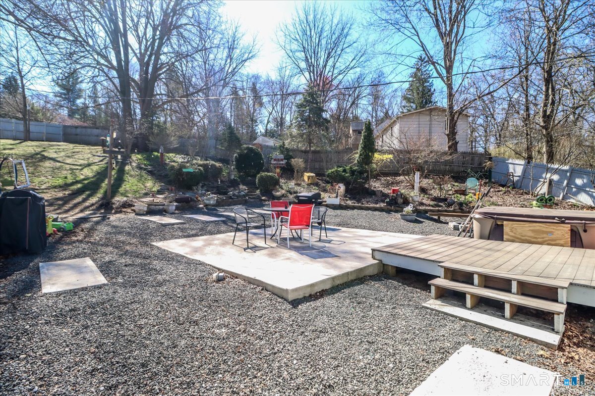 61 Pumpkin Hill Road New Milford, CT 06776 - Photo 34 of 40 a view of a backyard with sitting area