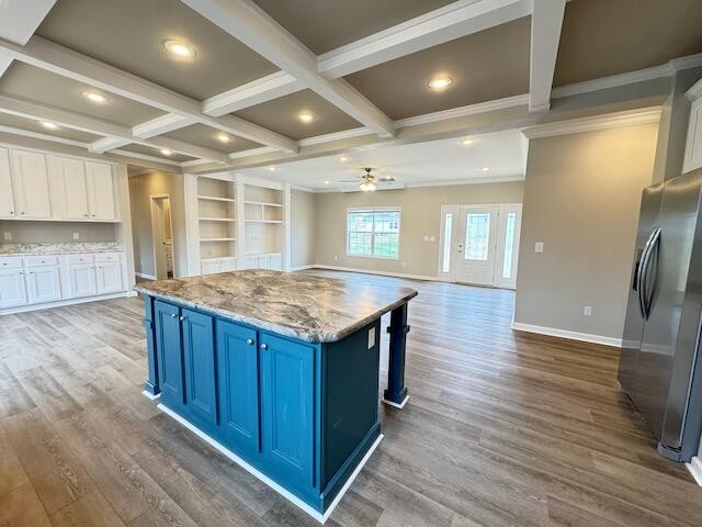 122 Underwood Road, Unit 3 Sweetwater, TN 37874 - Photo 16 of 52 an open kitchen with a sink and wooden floor