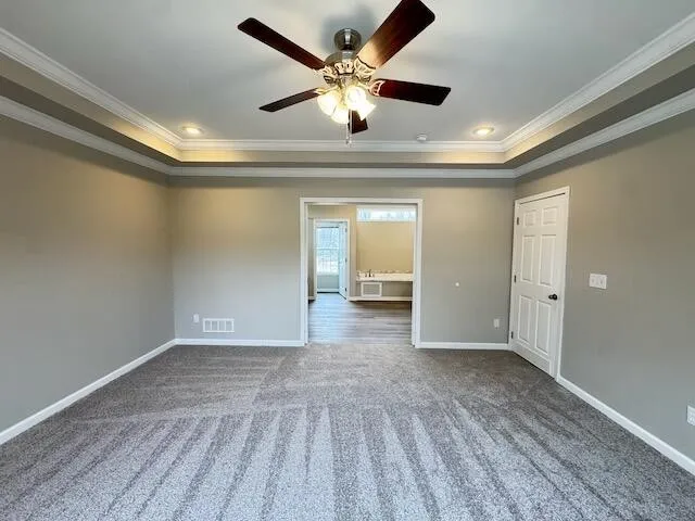 a view of an empty room and window