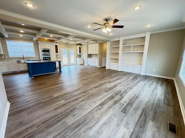 122 Underwood Road, Unit 3 Sweetwater, TN 37874 - Photo 3 of 52 an empty room with wooden floor and ceiling fan