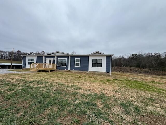 122 Underwood Road, Unit 3 Sweetwater, TN 37874 - Photo 50 of 52 a front view of a house with a garden