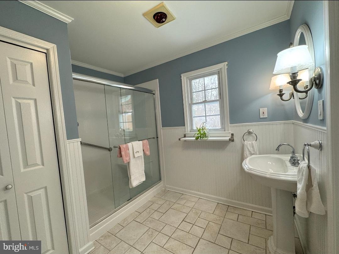 1105 Yardley Commons Yardley, PA 19067 - Photo 17 of 24 a bathroom with a sink mirror and window