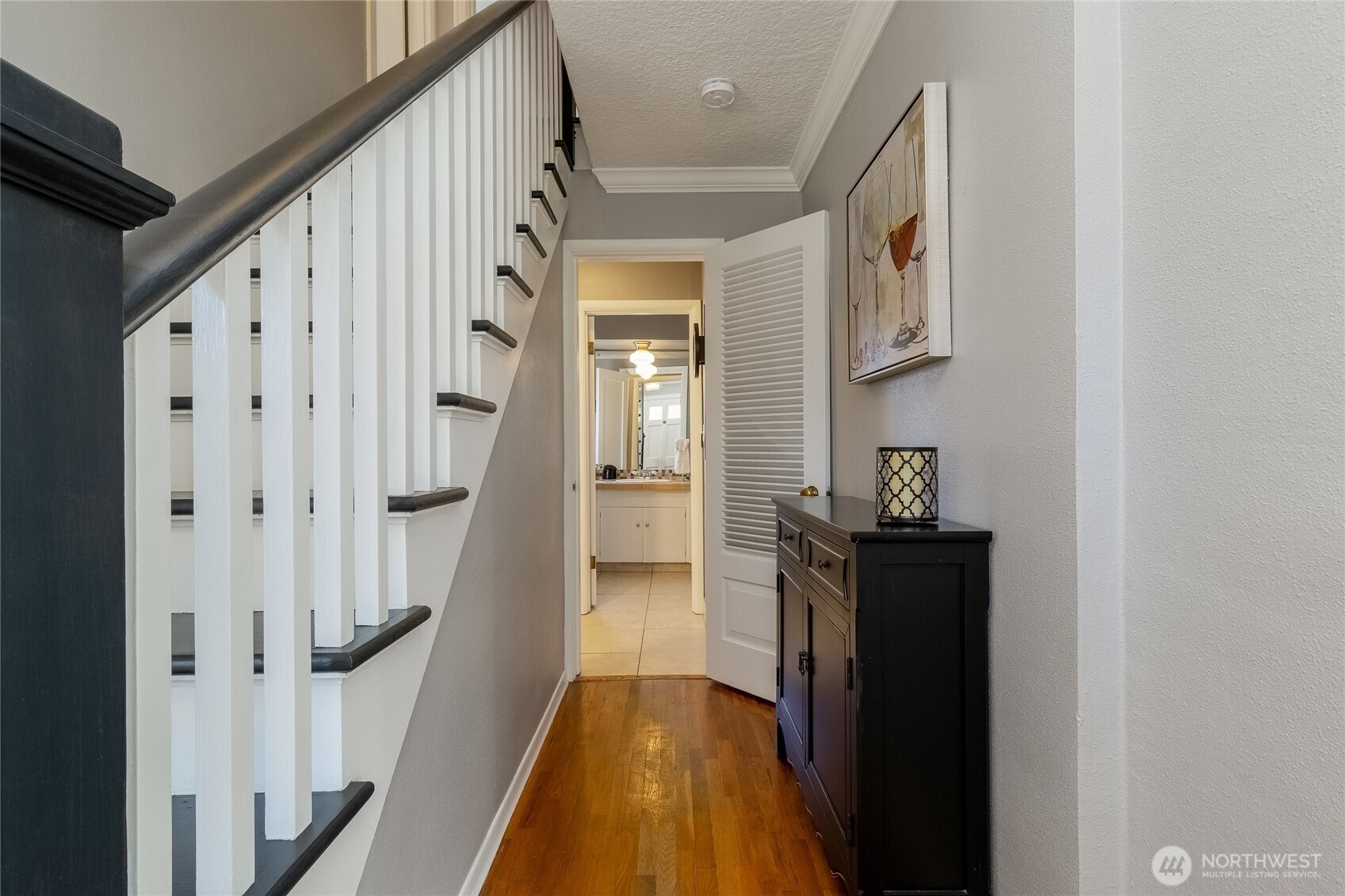 1402 Howard Street Walla Walla, WA 99362 - Photo 13 of 34 a view of a hallway with wooden floor and staircase