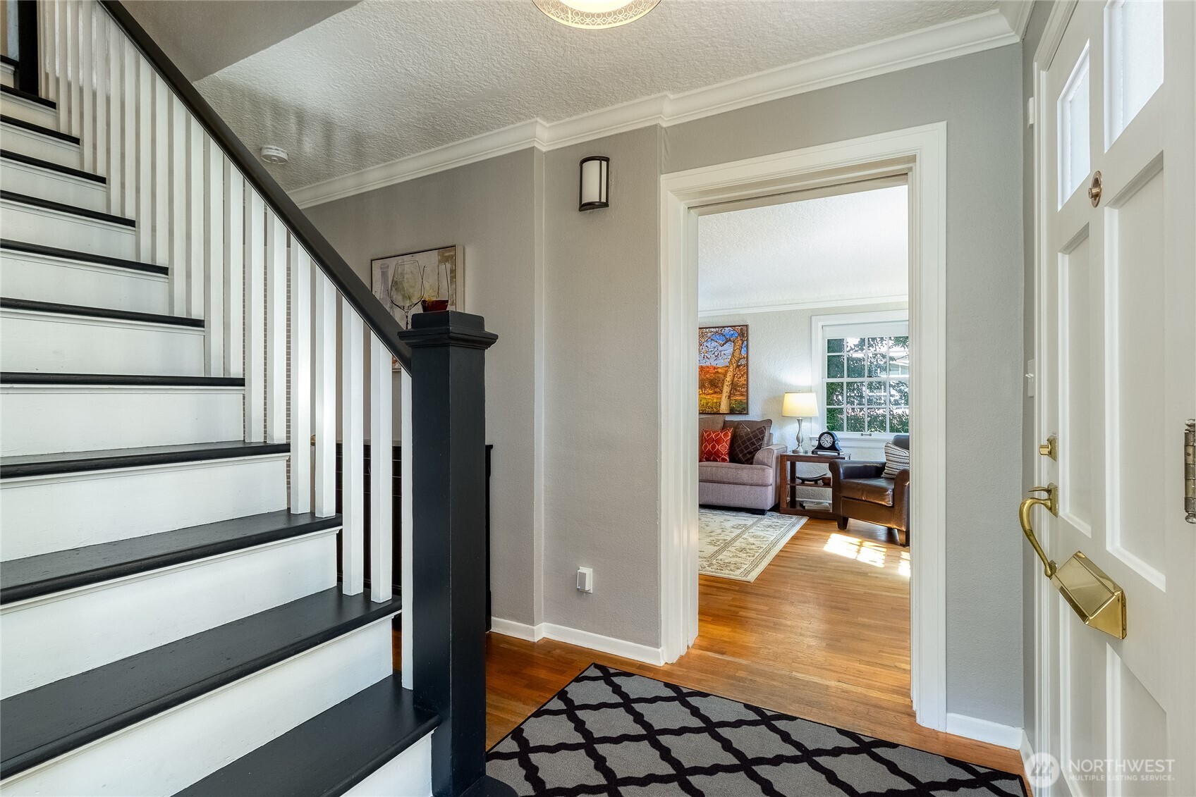 1402 Howard Street Walla Walla, WA 99362 - Photo 2 of 34 a view of a hallway view with living room and wooden floor