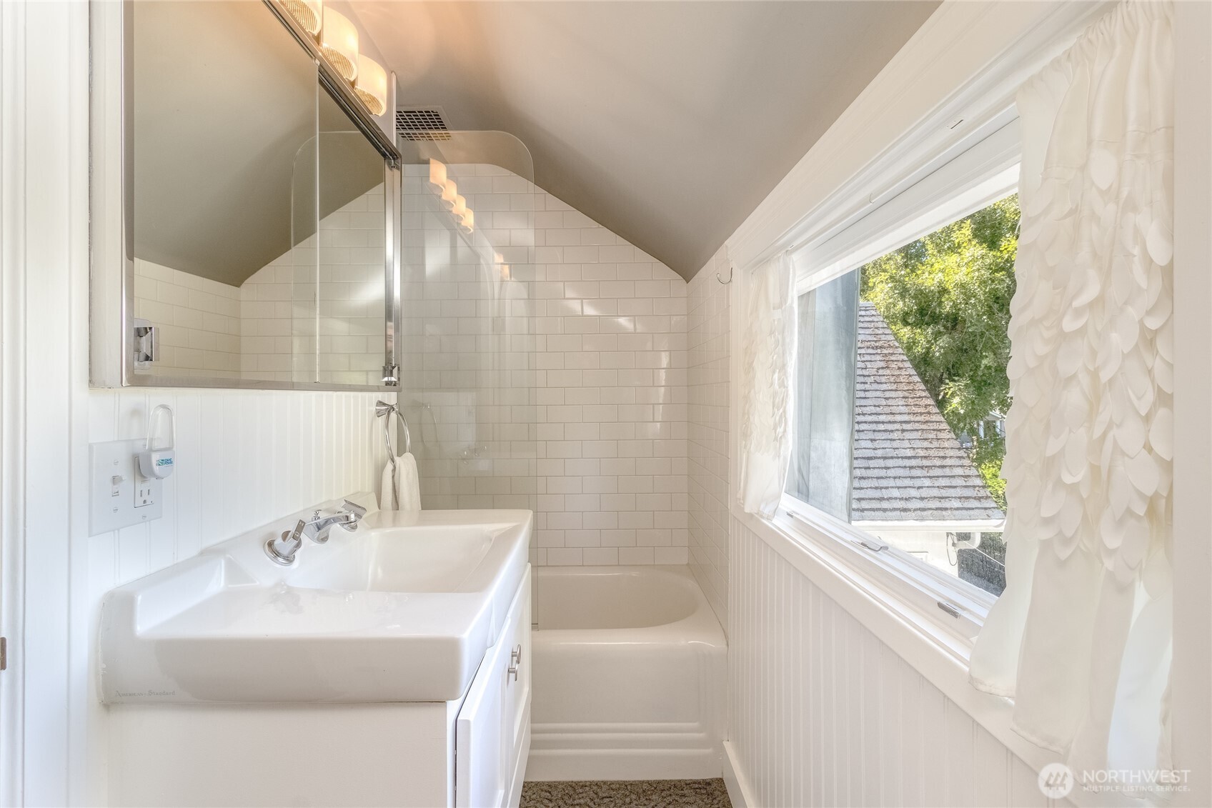 1402 Howard Street Walla Walla, WA 99362 - Photo 23 of 34 a bathroom with a sink a bathtub and a shower