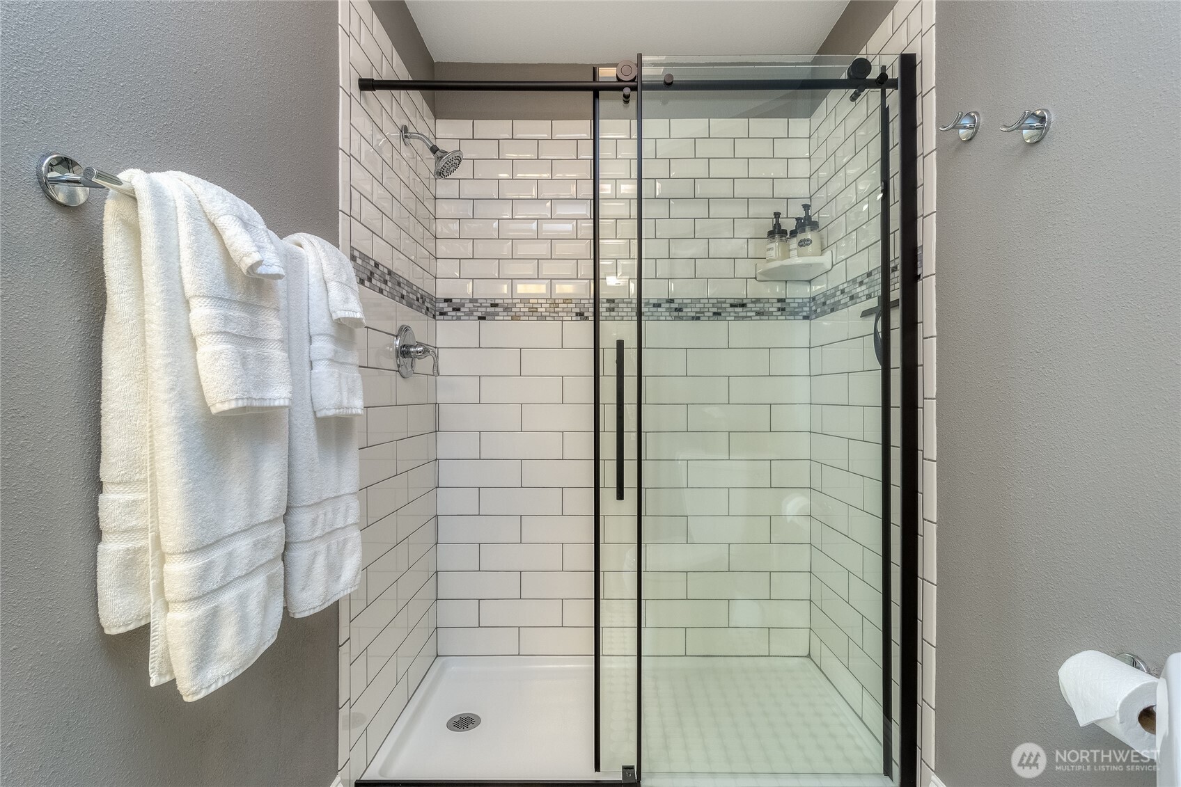 1402 Howard Street Walla Walla, WA 99362 - Photo 10 of 34 a bathroom with a shower and a mirror