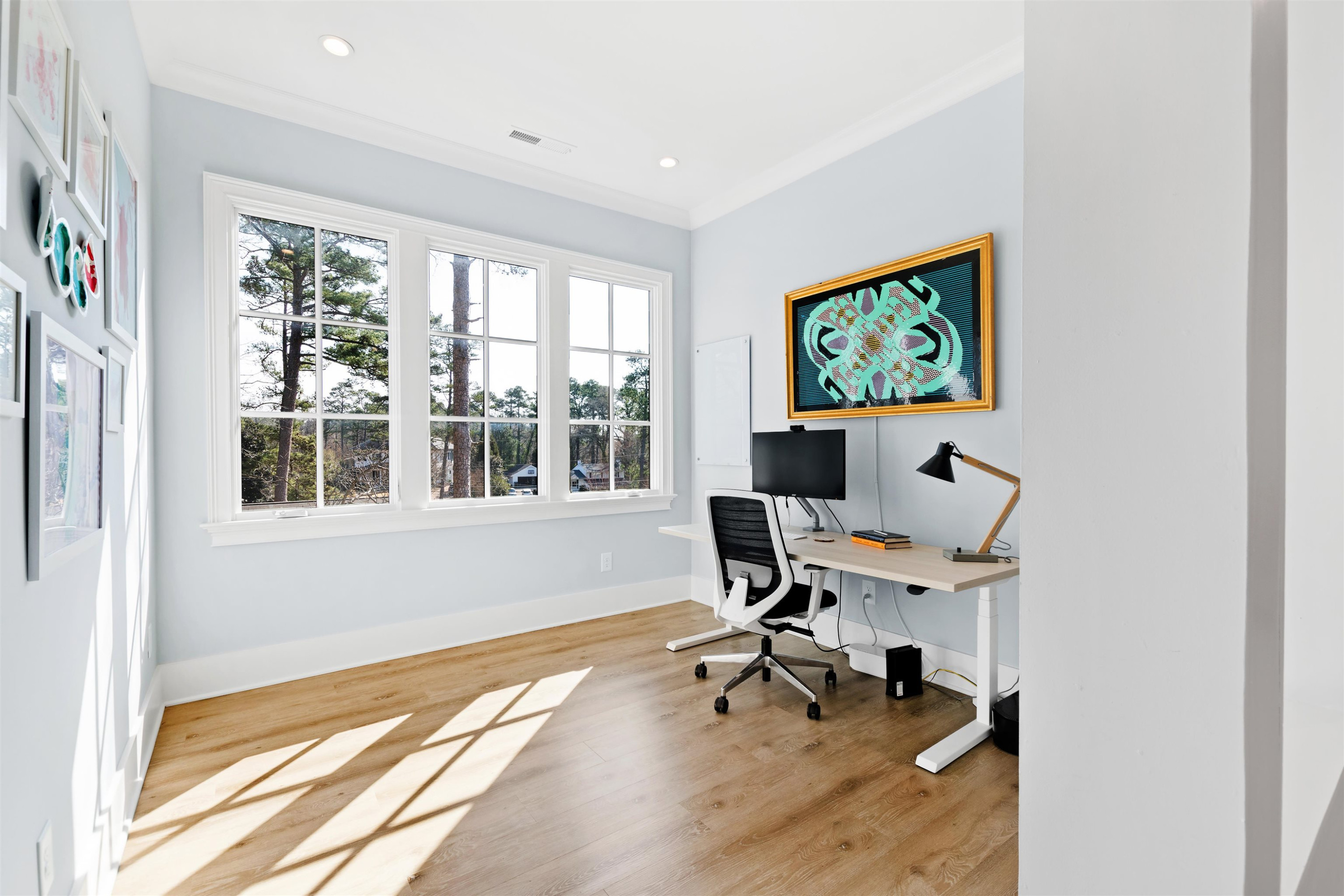 3314 Turnbridge Drive Raleigh, NC 27609 - Photo 54 of 64 a view of a workspace with furniture and a window