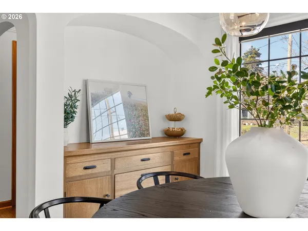 a view of table chair and potted plant