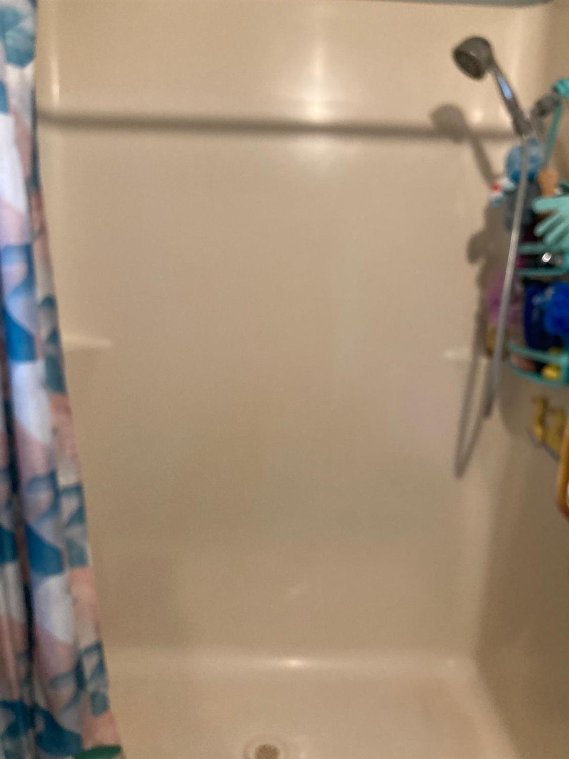 3950 Mack Road, Unit 182 Sacramento, CA 95823 - Photo 13 of 35 a bathroom with a bathtub