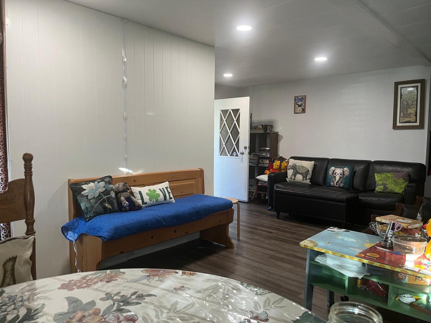 3950 Mack Road, Unit 182 Sacramento, CA 95823 - Photo 30 of 35 a living room with furniture and a couch