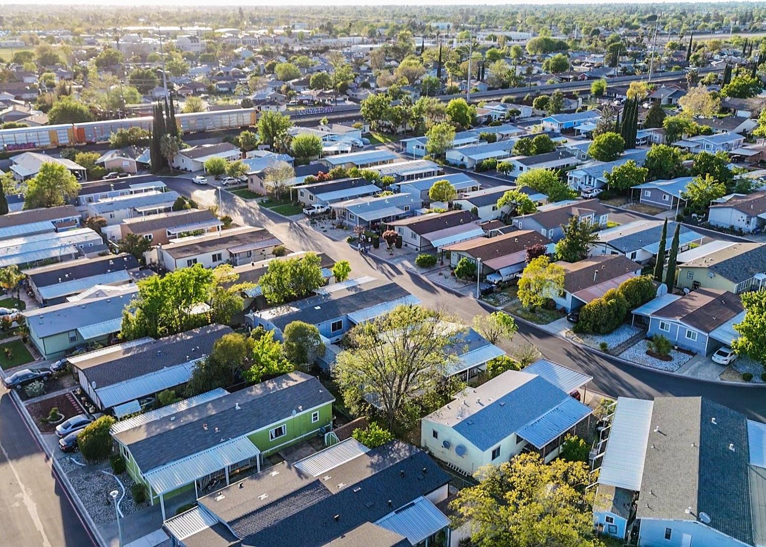 3950 Mack Road, Unit 182 Sacramento, CA 95823 - Photo 3 of 35 an aerial view of a city with lots of residential buildings