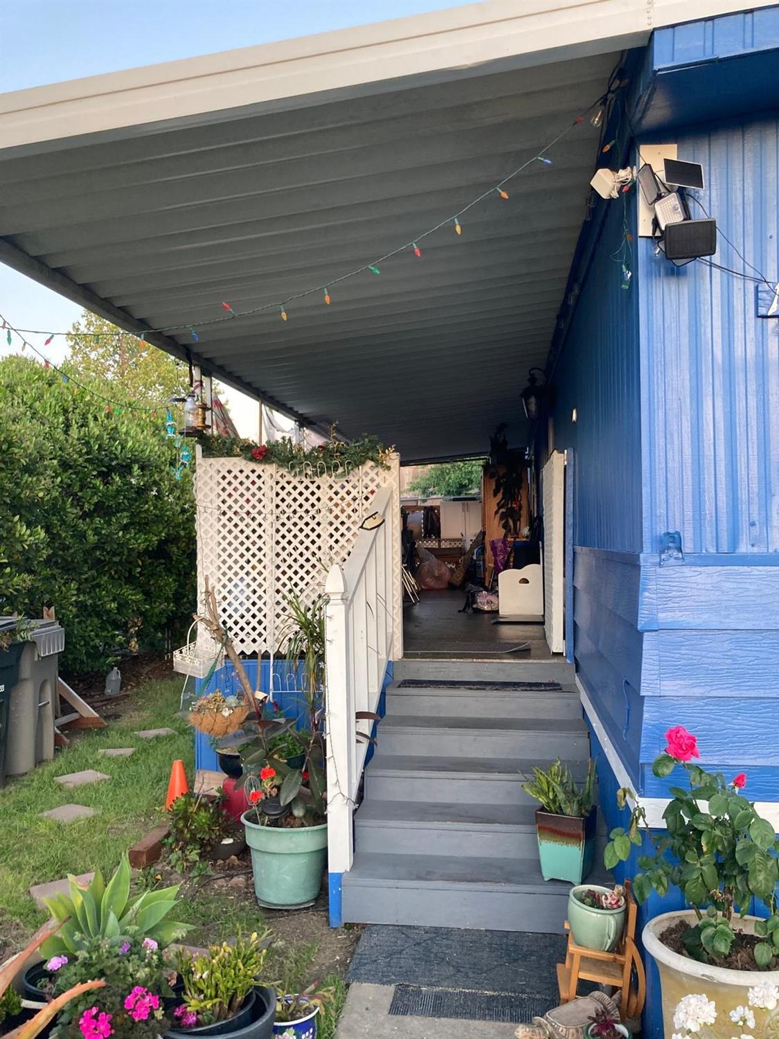 3950 Mack Road, Unit 182 Sacramento, CA 95823 - Photo 32 of 35 a view of a porch with furniture