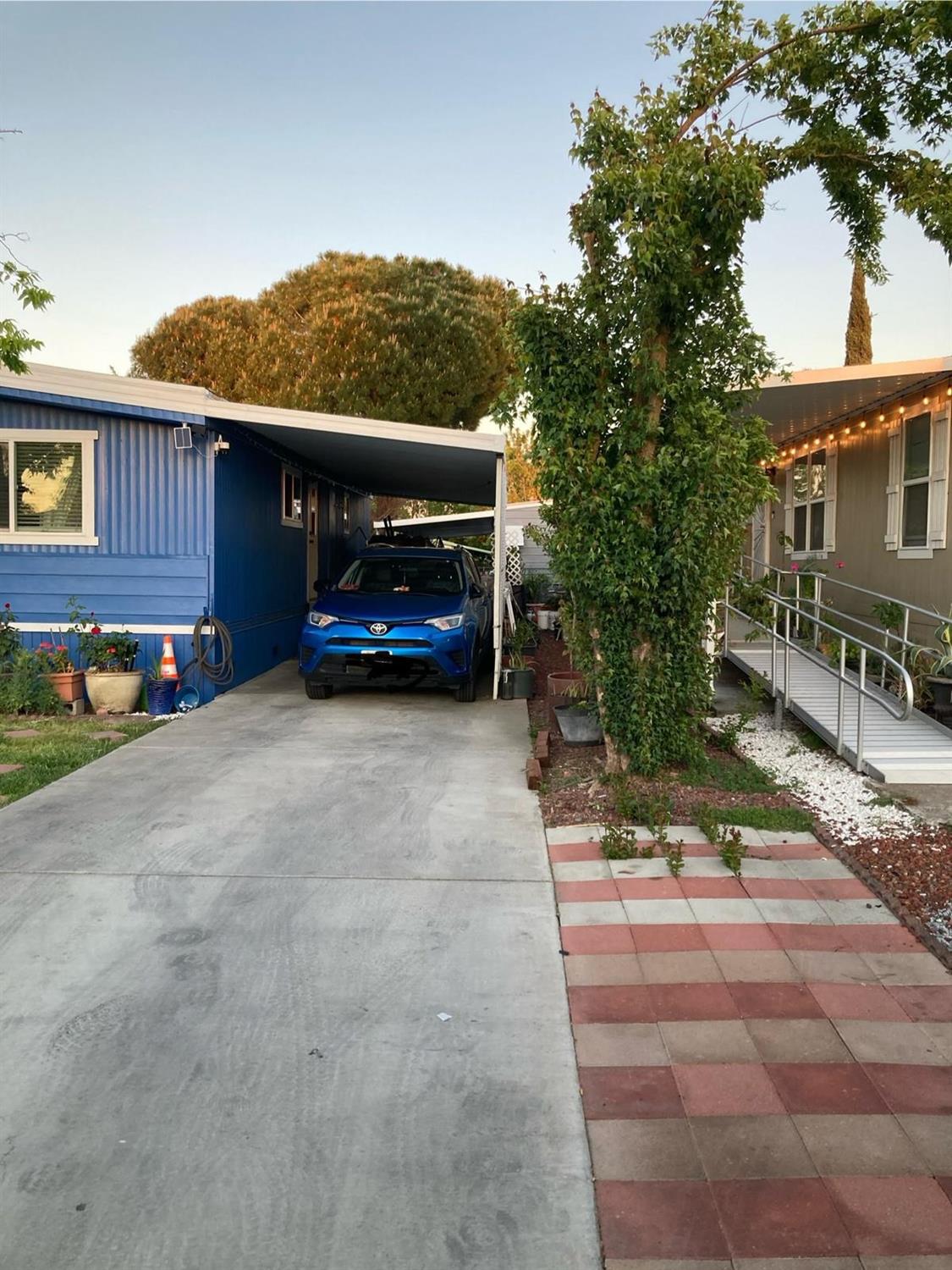 3950 Mack Road, Unit 182 Sacramento, CA 95823 - Photo 34 of 35 a car parked in front of a building