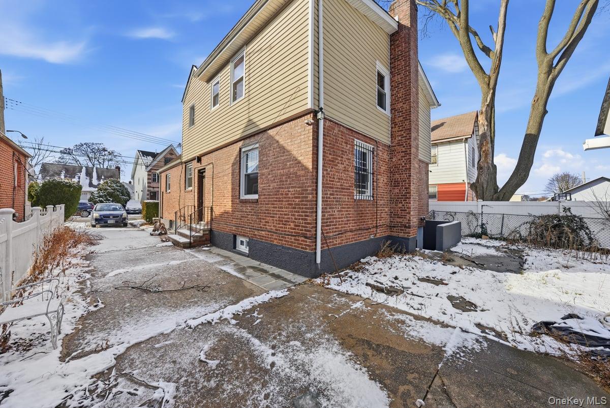 118-27 201st Street Queens, NY 11412 - Photo 34 of 36 a view of a backyard of the house