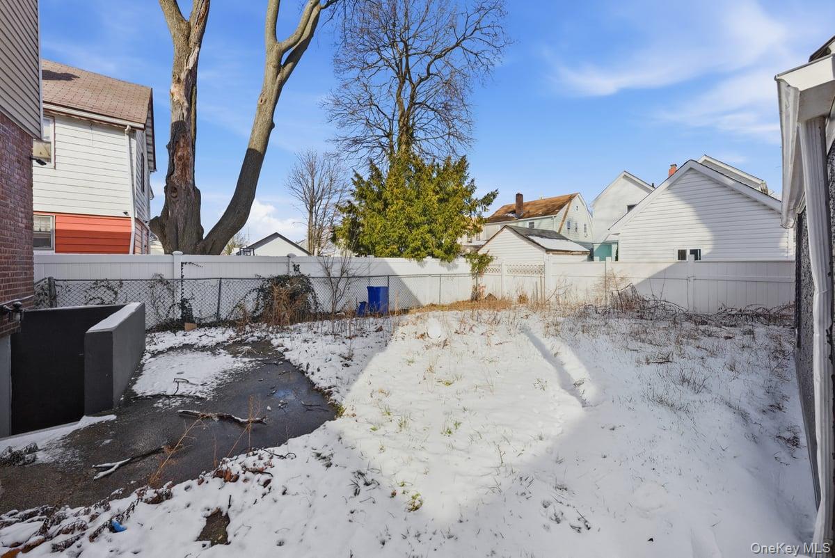 118-27 201st Street Queens, NY 11412 - Photo 35 of 36 a view of a backyard of a house