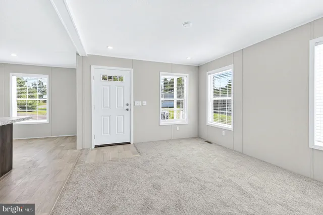 a view of a kitchen with a sink