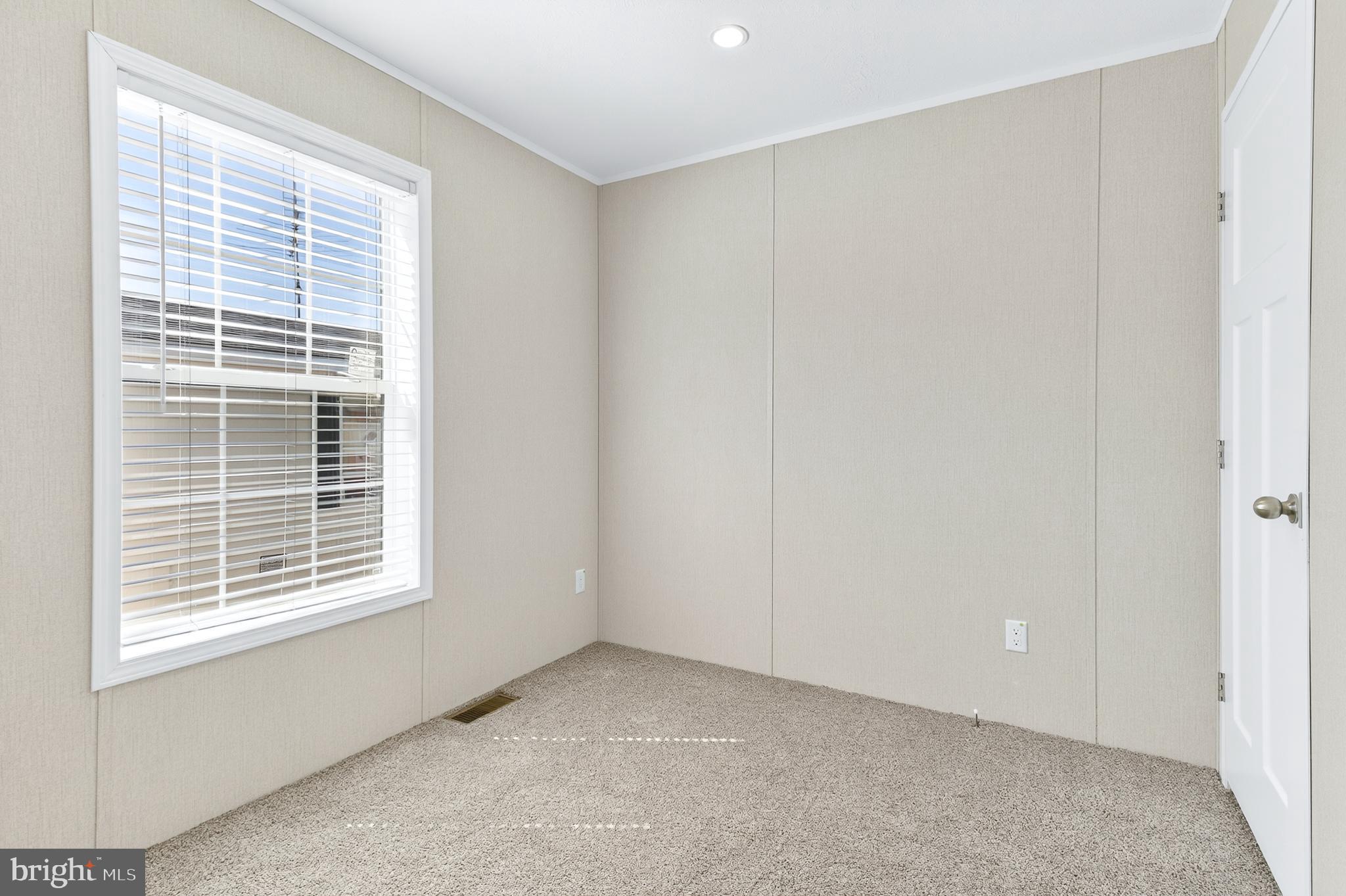 201 Bordic Road Reading, PA 19606 - Photo 6 of 30 a view of an empty room with a window