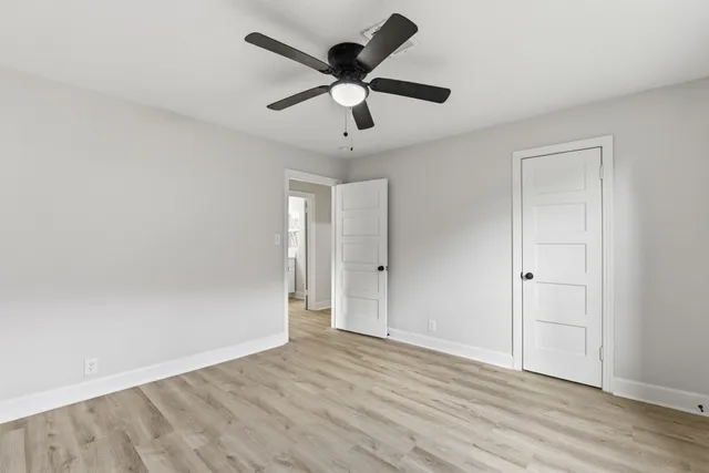 a view of a big room with wooden floor