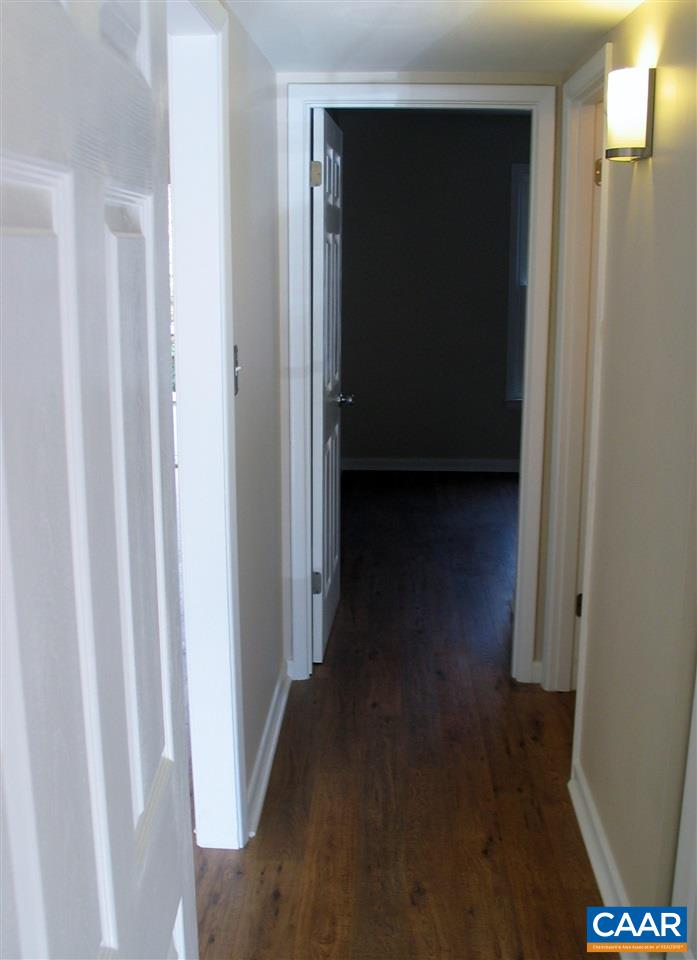 2527 Hydraulic Road, Unit 1 Charlottesville, VA 22901 - Photo 13 of 25 a view of a hallway