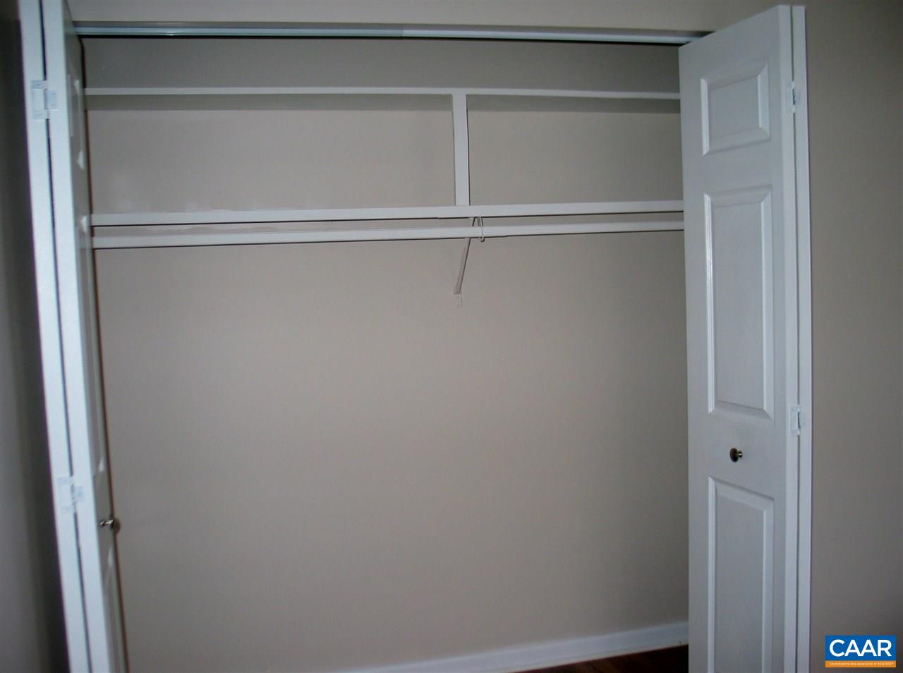 2527 Hydraulic Road, Unit 1 Charlottesville, VA 22901 - Photo 18 of 25 a view of an empty walk in closet