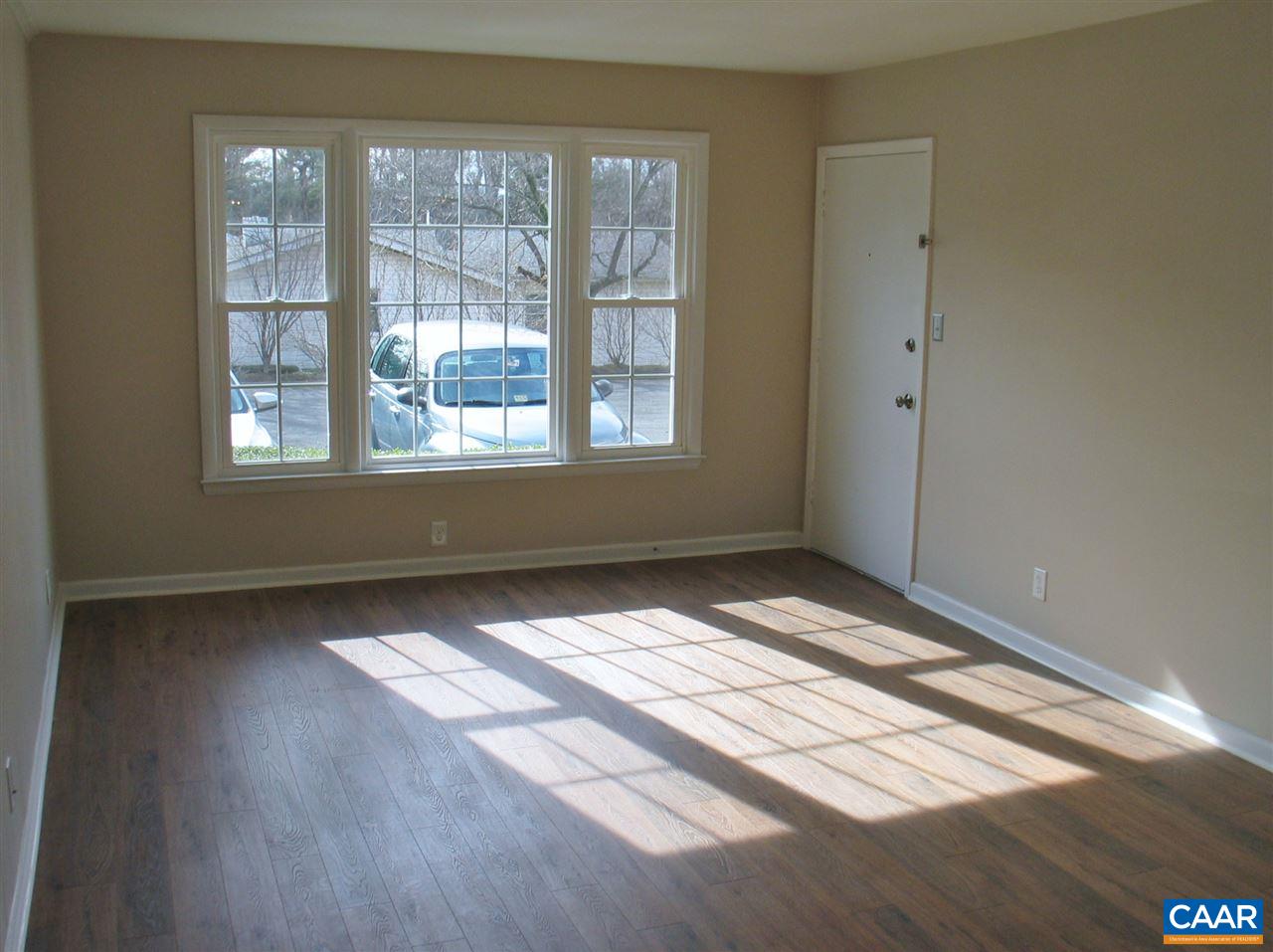 2527 Hydraulic Road, Unit 1 Charlottesville, VA 22901 - Photo 3 of 25 a view of an empty room and window