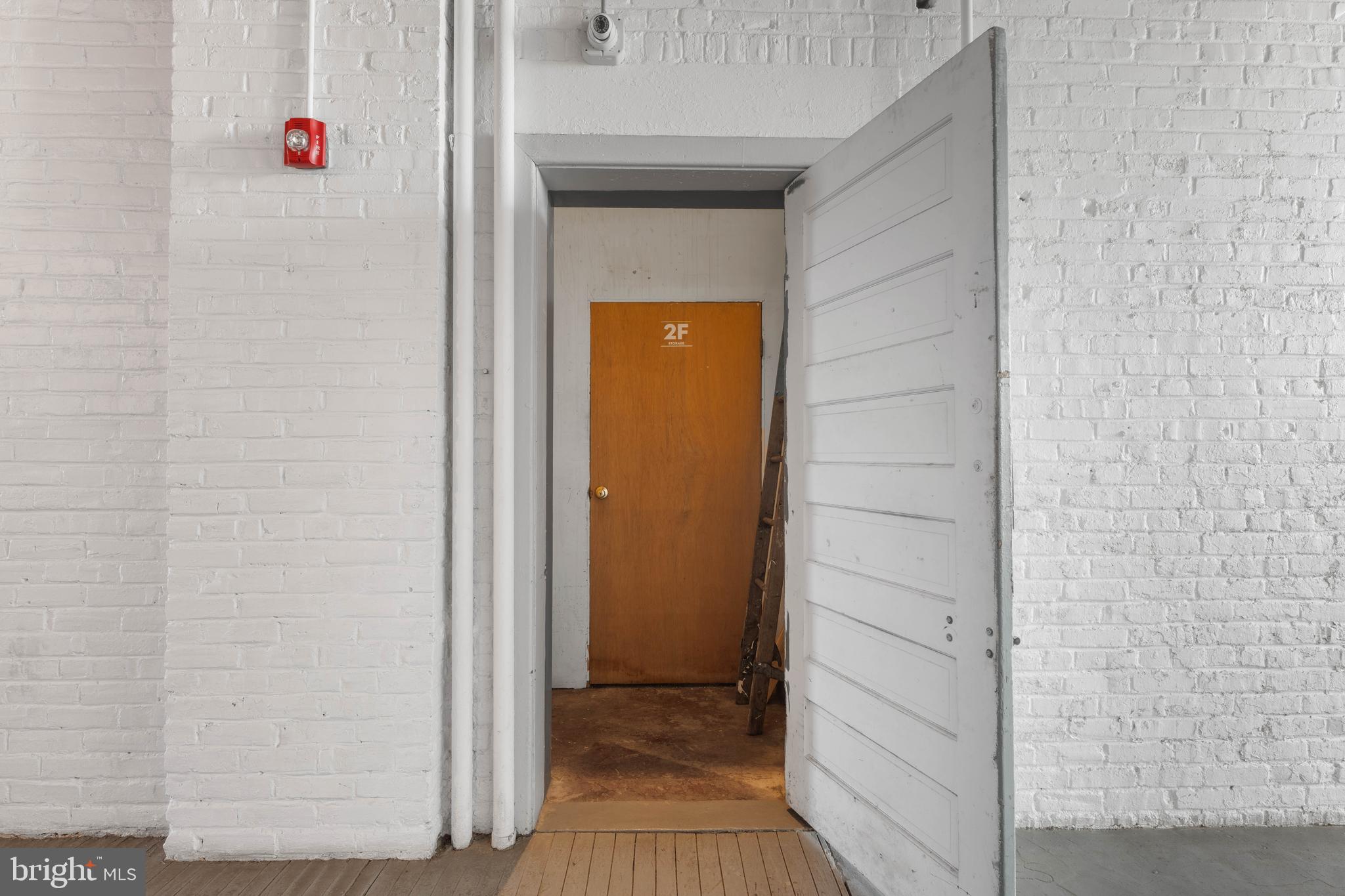 700 South 10th Street, Unit 2F Philadelphia, PA 19147 - Photo 27 of 40 a view of a hallway with wooden floor and closet