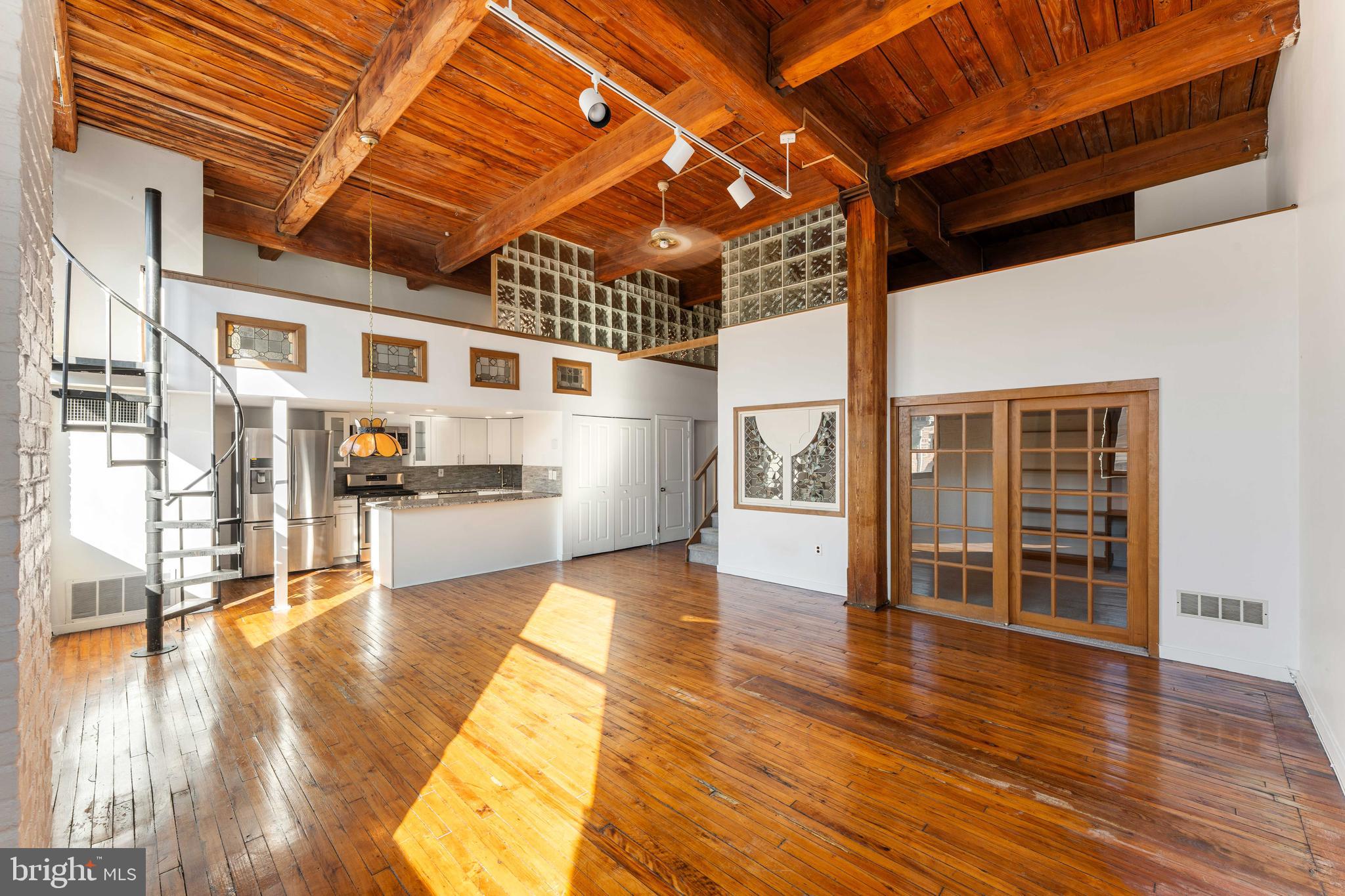 700 South 10th Street, Unit 2F Philadelphia, PA 19147 - Photo 8 of 40 a view of livingroom with wooden floor