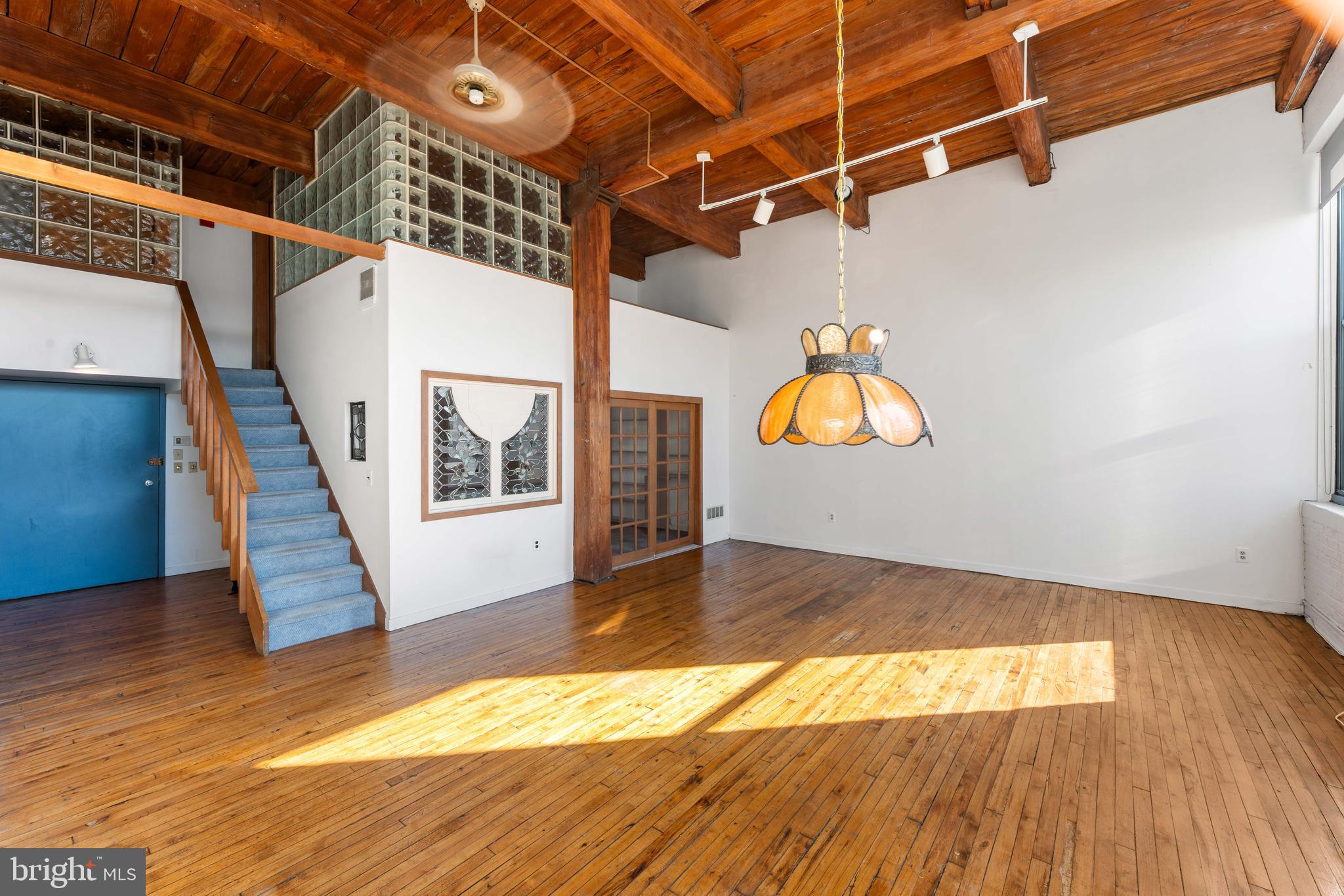 700 South 10th Street, Unit 2F Philadelphia, PA 19147 - Photo 9 of 40 a view of empty room with wooden floor
