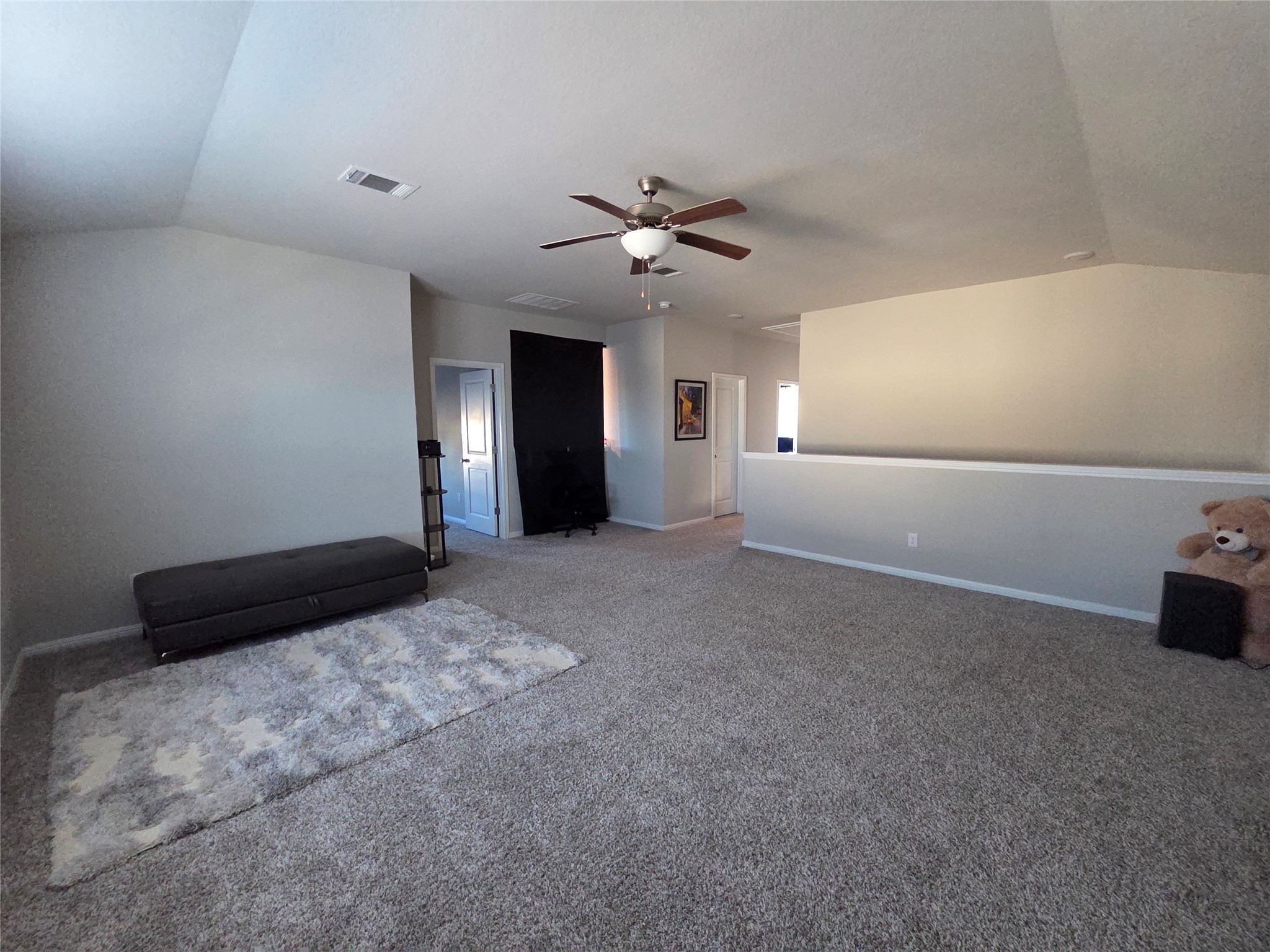 300 Windy Reed Road Hutto, TX 78634 - Photo 11 of 24 a view of a livingroom with a ceiling fan and window