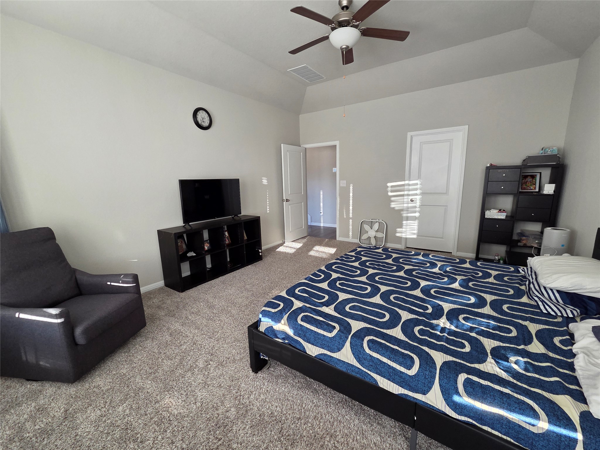300 Windy Reed Road Hutto, TX 78634 - Photo 19 of 24 a bedroom with a bed and couch