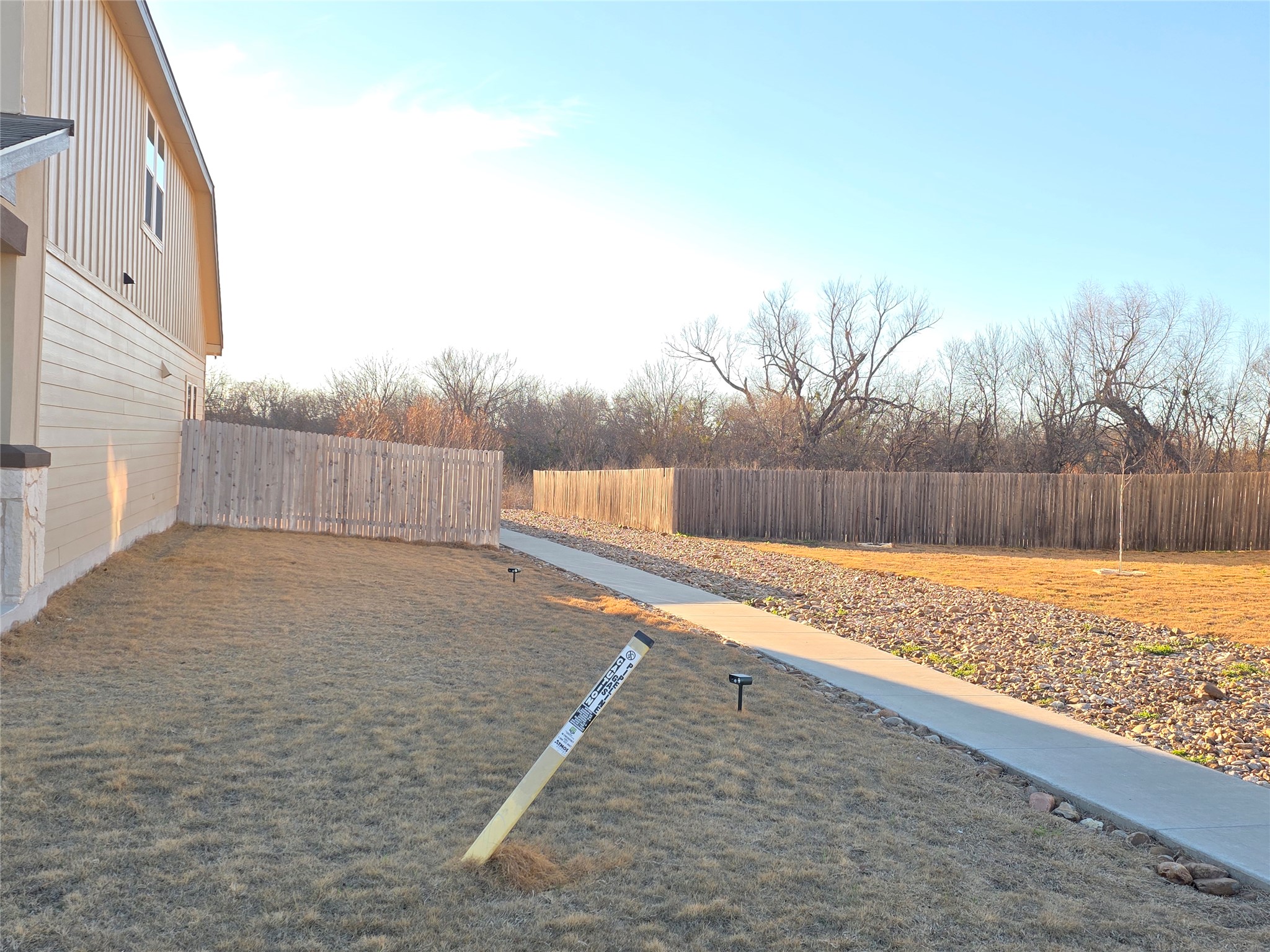300 Windy Reed Road Hutto, TX 78634 - Photo 2 of 24 a view of a backyard