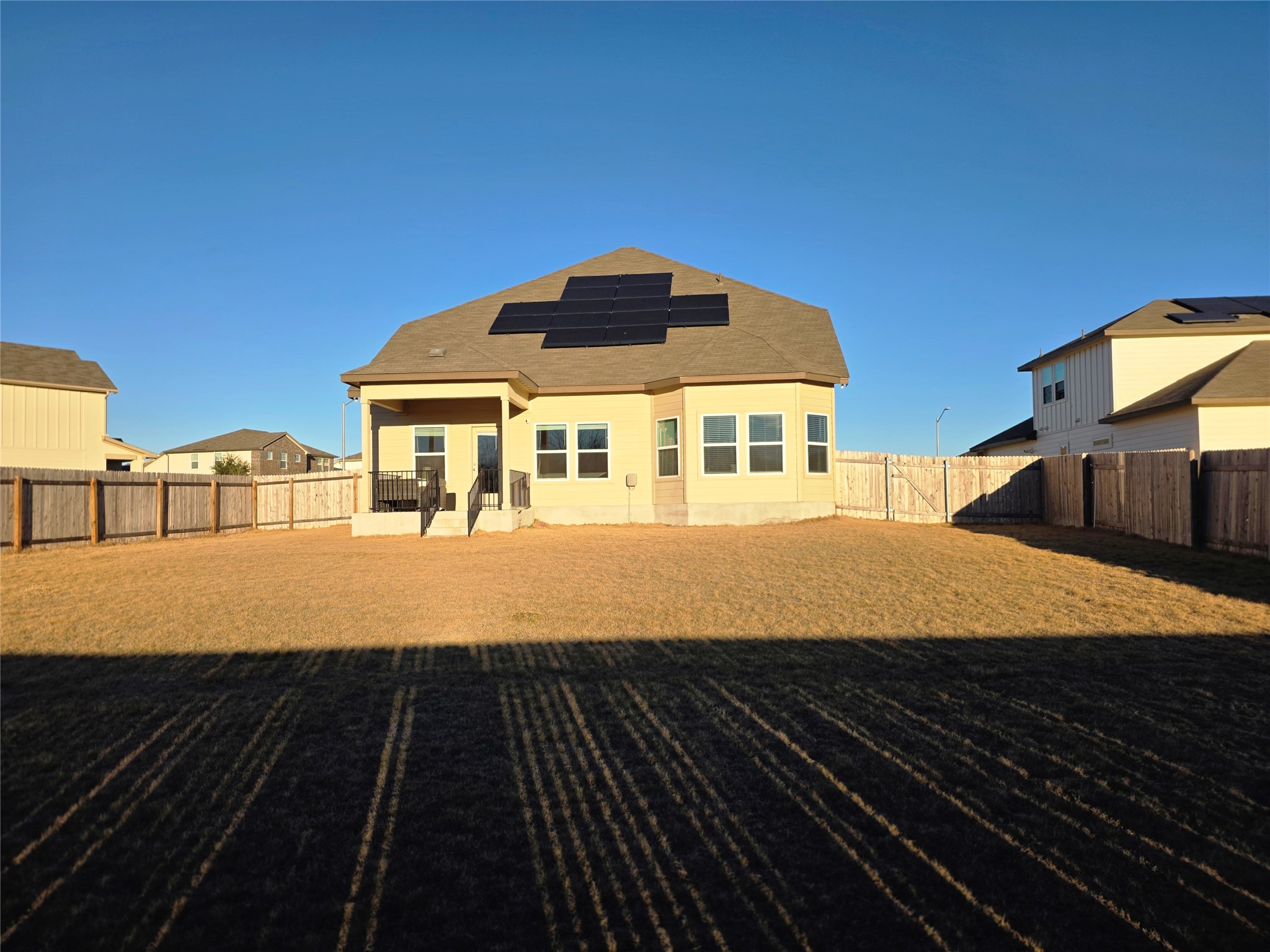 300 Windy Reed Road Hutto, TX 78634 - Photo 23 of 24 a front view of a house with a yard